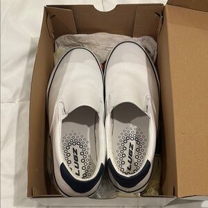 Lugz White and Black Slip-On Sneakers